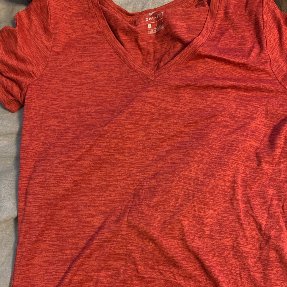 Women’s Nike Dri-Fit shirt. Large